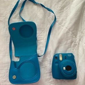 instax blue polaroid camera
